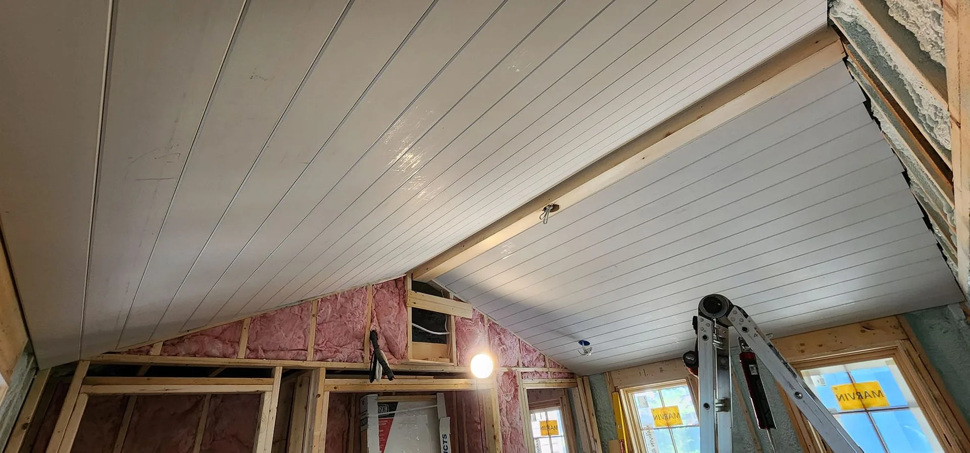 Shiplap ceiling installation in progress